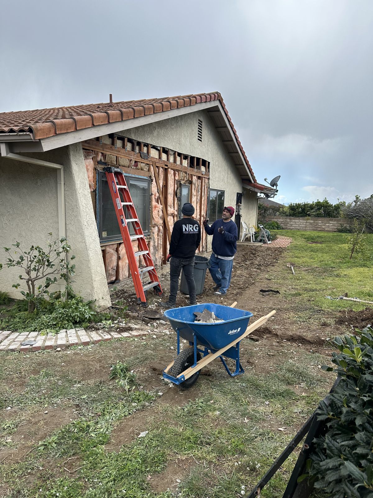 Remodel in progress with the exterior wall opened to the studs