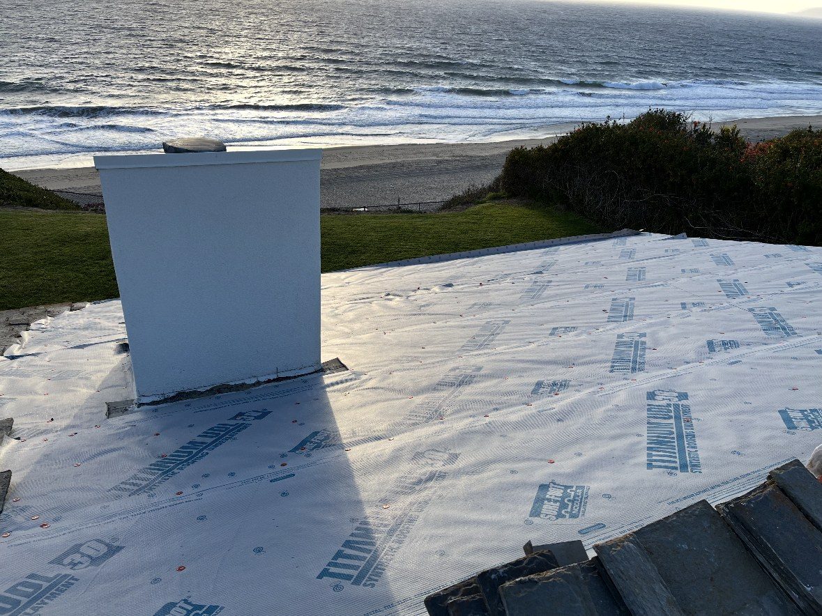 Titanium synthetic underlayment installed on an oceanfront roof before tile