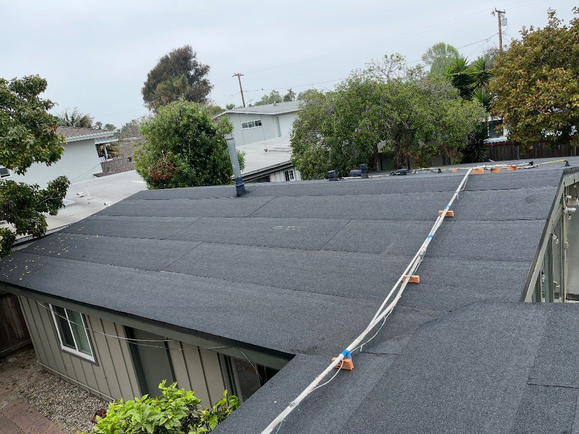 Completed torch-down modified bitumen low-slope roof